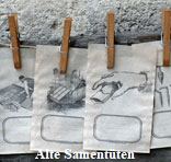 Alte Samentüten, mit Aussaatmotiven bedruckt